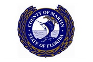 the seal for the county of Martin, FL: a cartoon marlin overlooking the ocean