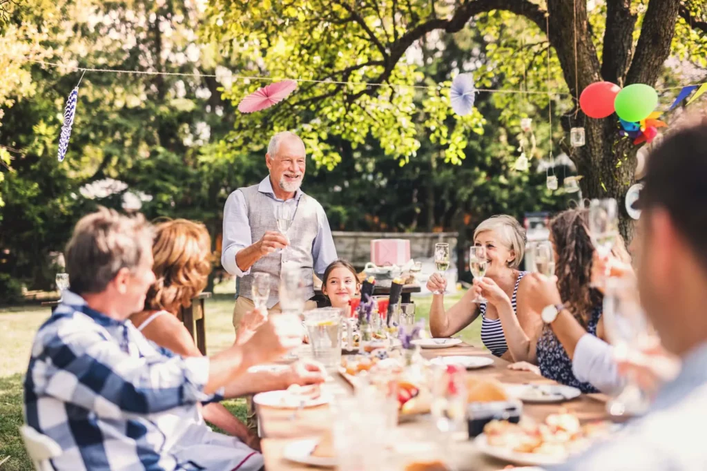Old man doing a toast at the party