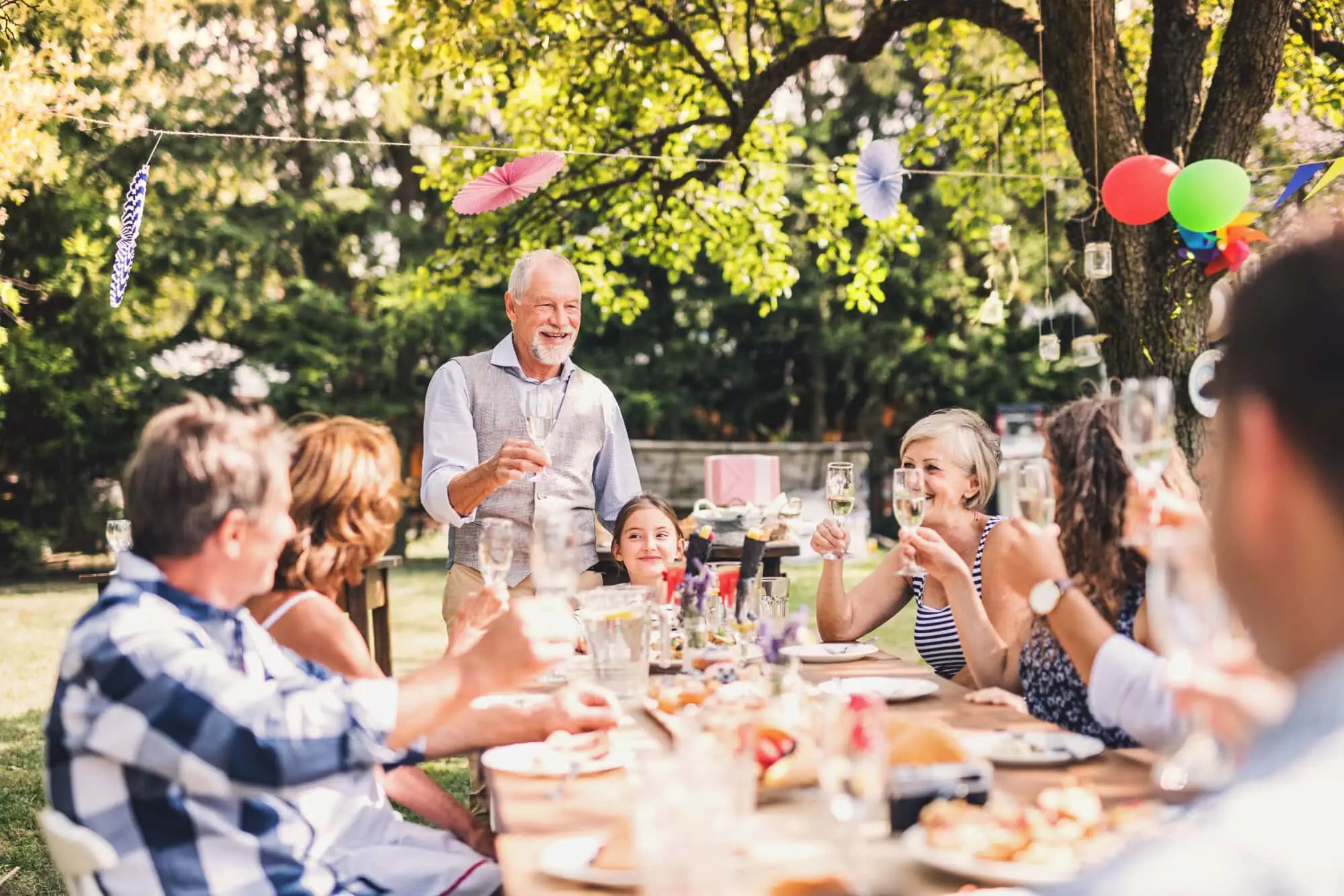 Old man doing a toast at the party
